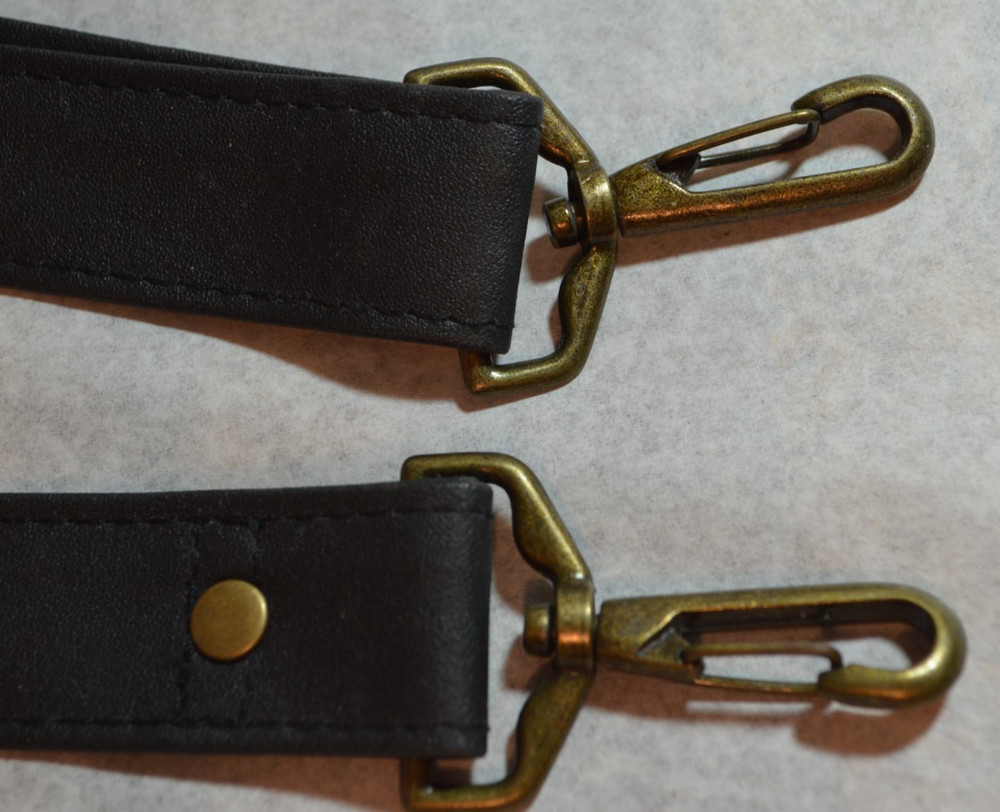 faux black leather adjustable (approx. 36-48") bag strap with shoulder pad