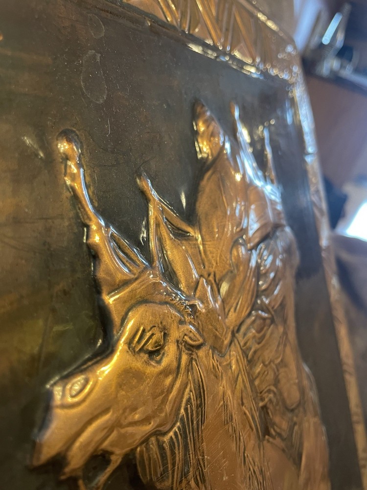 Middle Eastern repoussé metal wall plaque