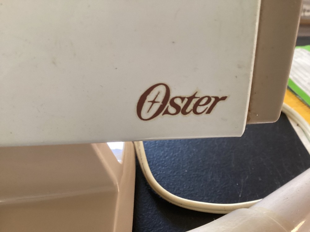 Oster Food Grinder Model 480 E, with attachments, and original paperwork