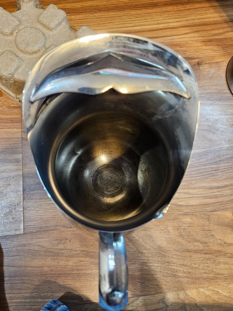 silver plated pitcher with pouring ice blocker