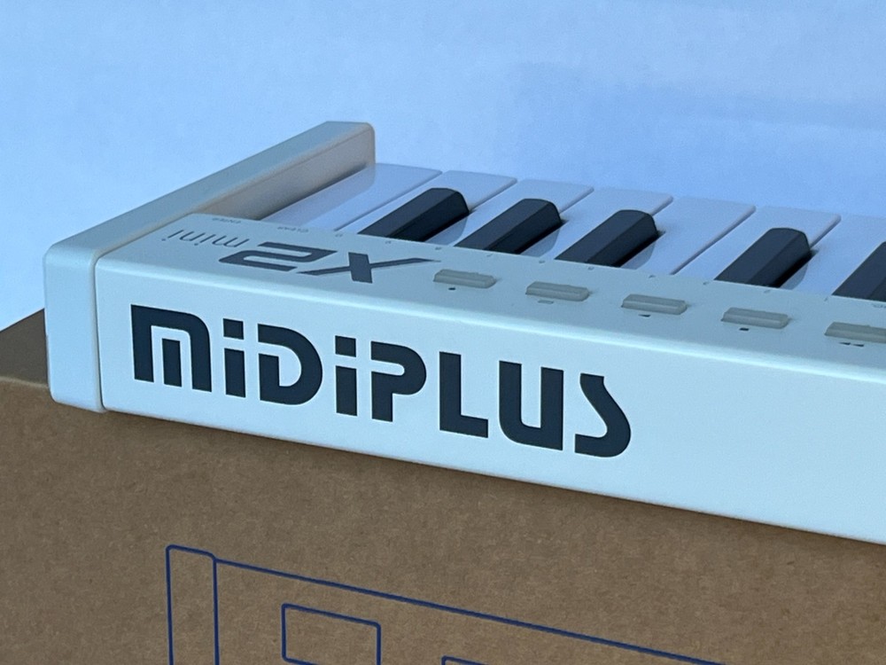 Compact X2 Mini Keyboard Controller 3-Inch in Sleek White Design USB w/ Box