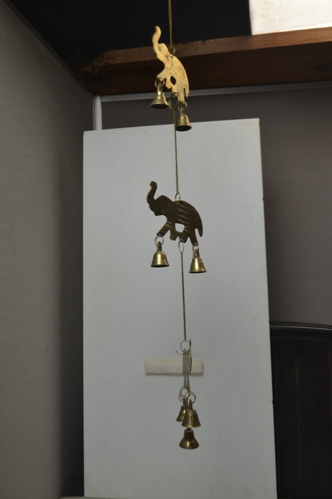 Brass elephants hanging chime with bells