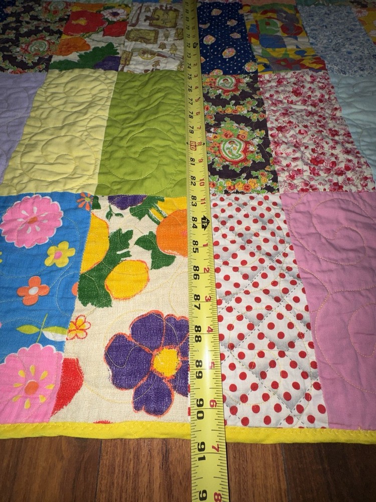 handmade multicolored cotton patchwork quilt featuring a reversible design7by7.5