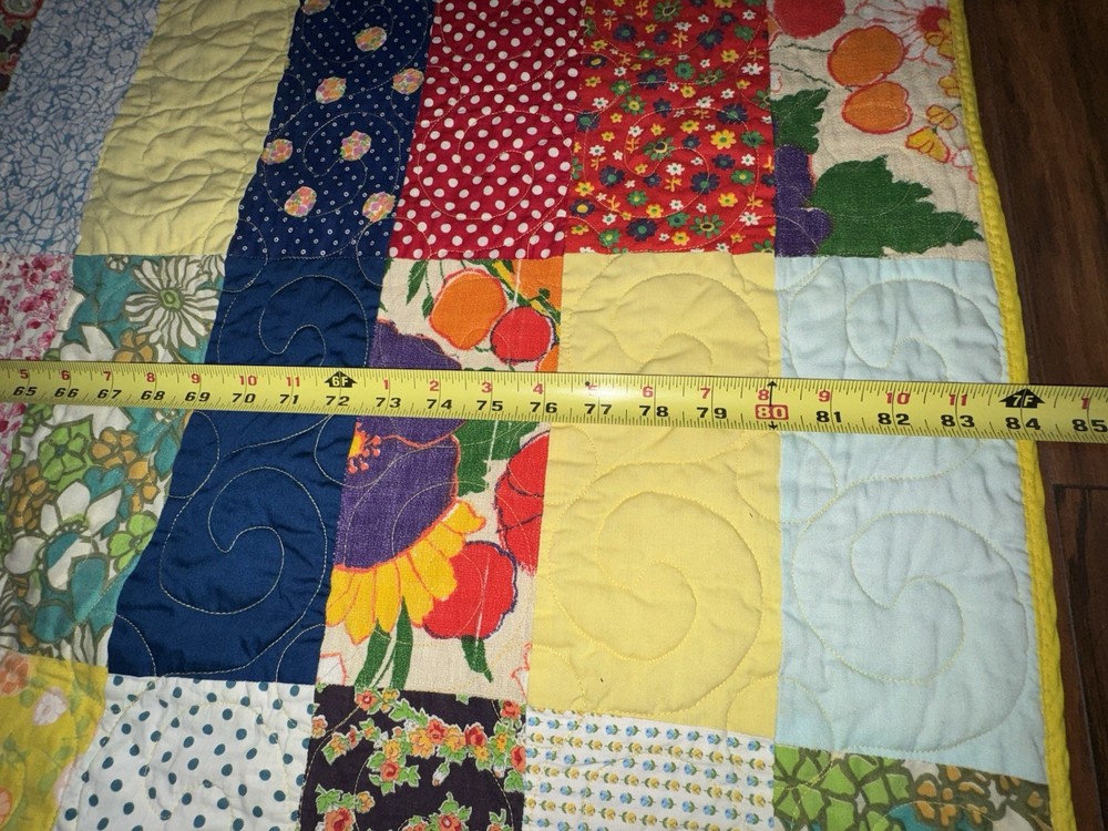 handmade multicolored cotton patchwork quilt featuring a reversible design7by7.5