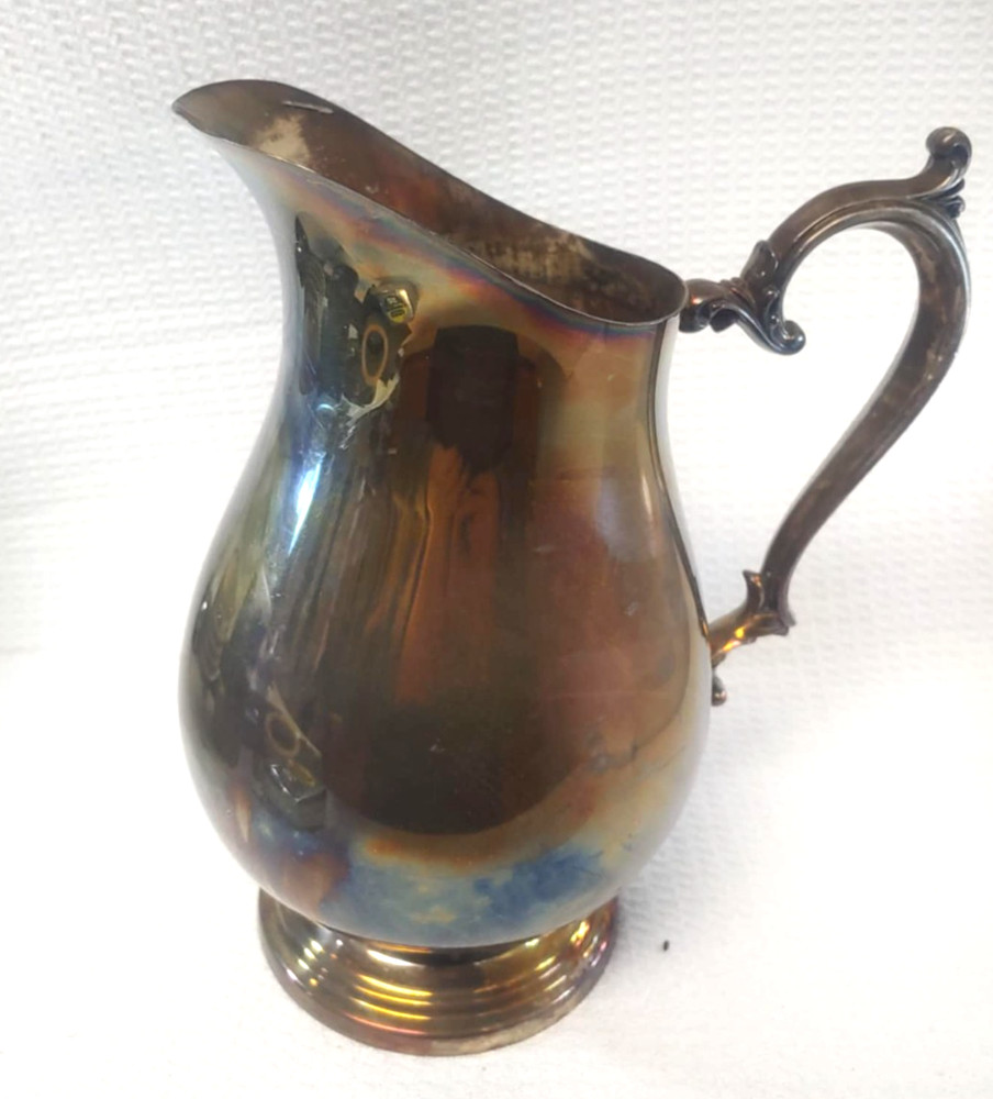 WM rogers water pitcher missing ice lip