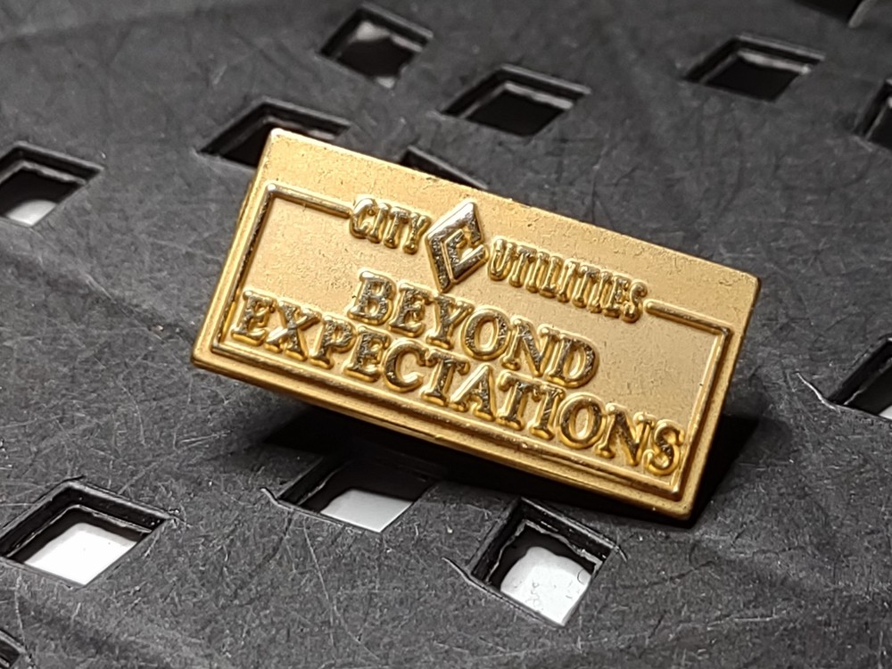 City Utilities Beyond Expectations Rectangular Pin