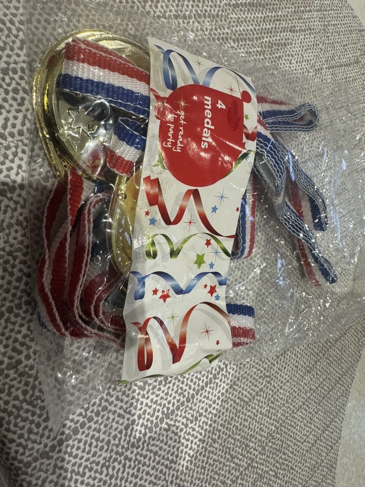 4 Plastic Toy Medals