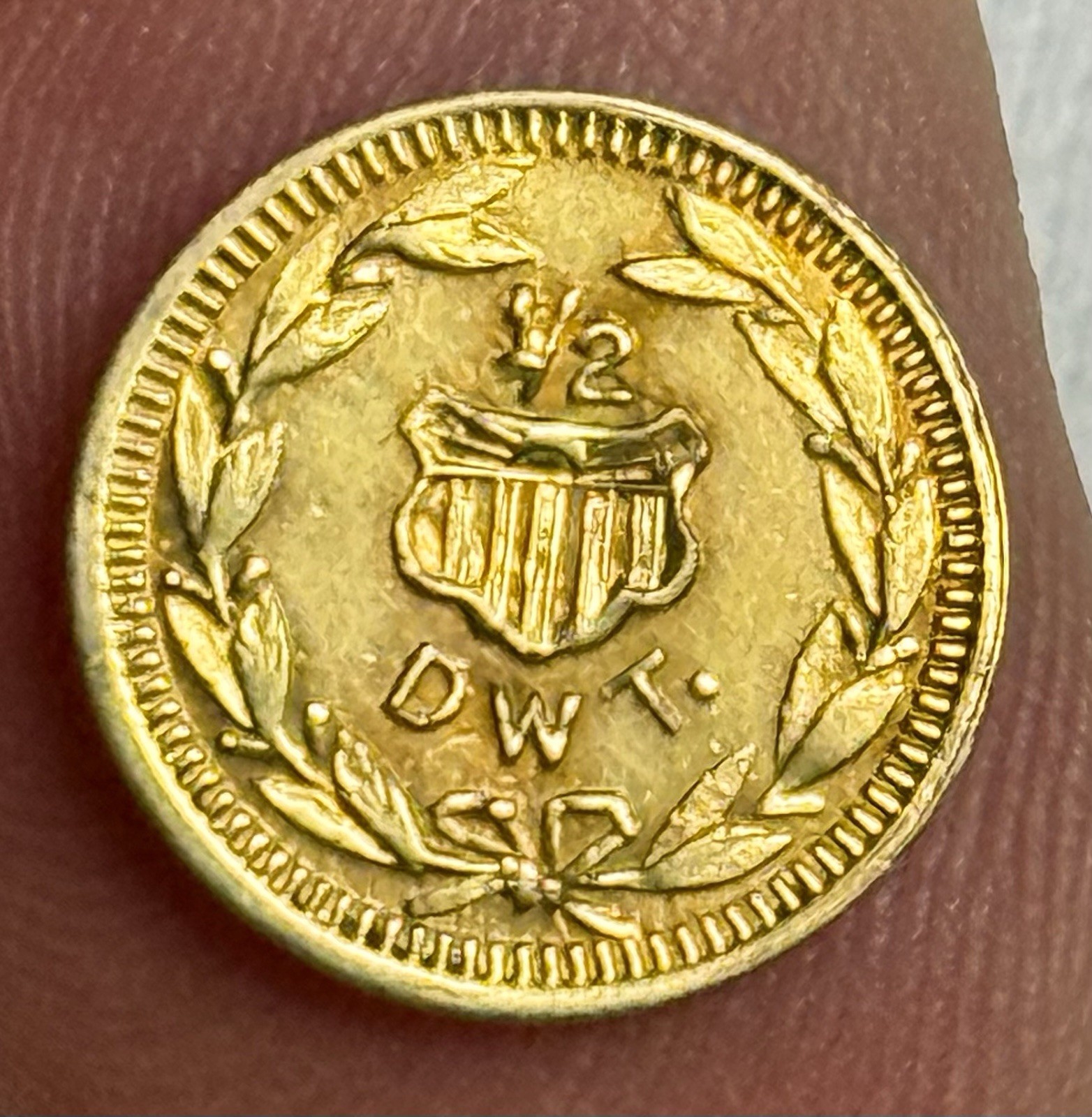 AU 1909 ALASKA YUKON Exposition 1/2 DWT (Dollar) Coin (0.79g; 0.025 Troy Oz)