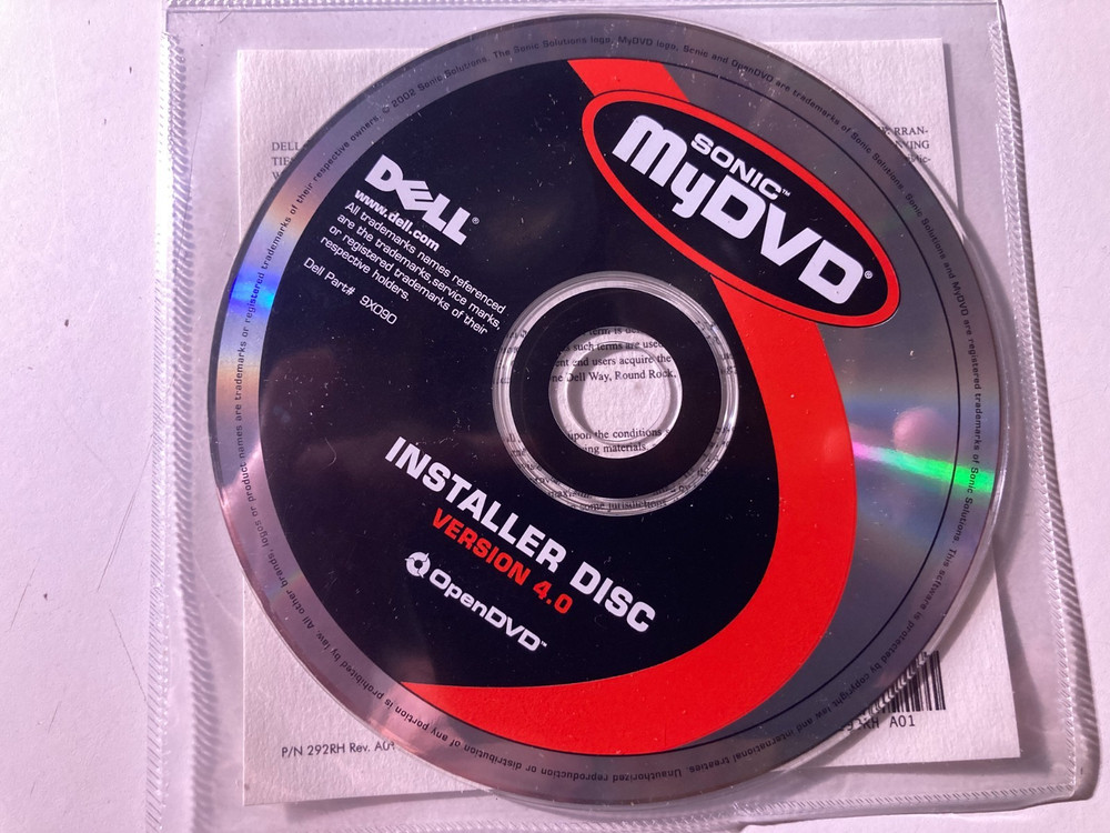 Six (6) - 2002 Dell Installation Discs; Drivers & Utilities; Roxio; CyberLink;