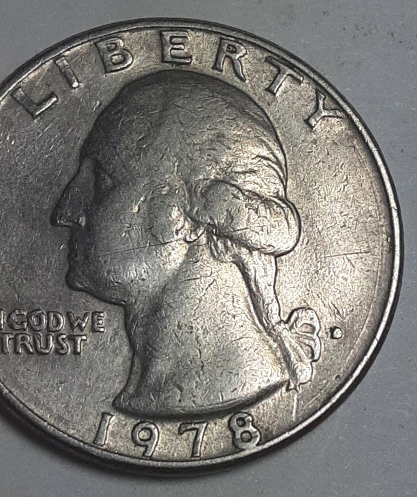 1978 D Washington Quarter in nice condition. Filled In Mint Mark.