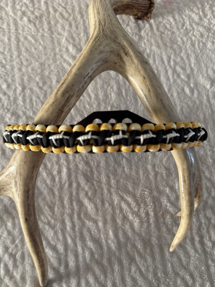 Black, Yellow And White Bow Wrist Sling