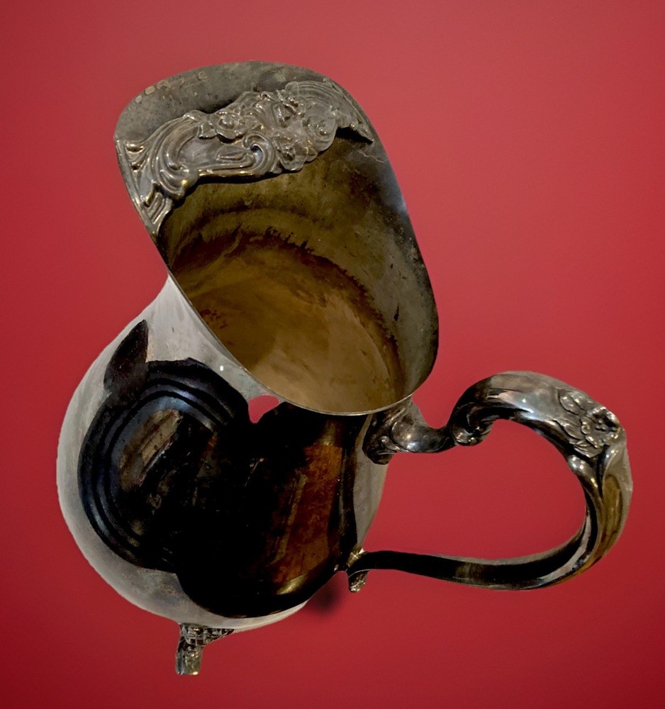 Silver Floral Repousse / Footed Water Pitcher W/ Ice Lip