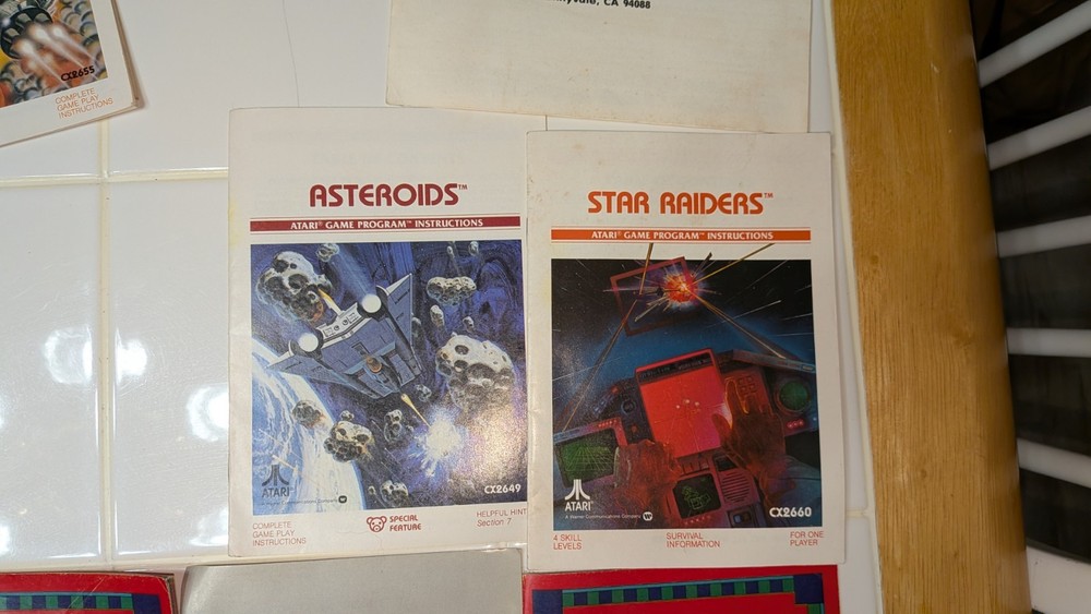atari game, instructions, and limited 90 day warranty card bundle. no console