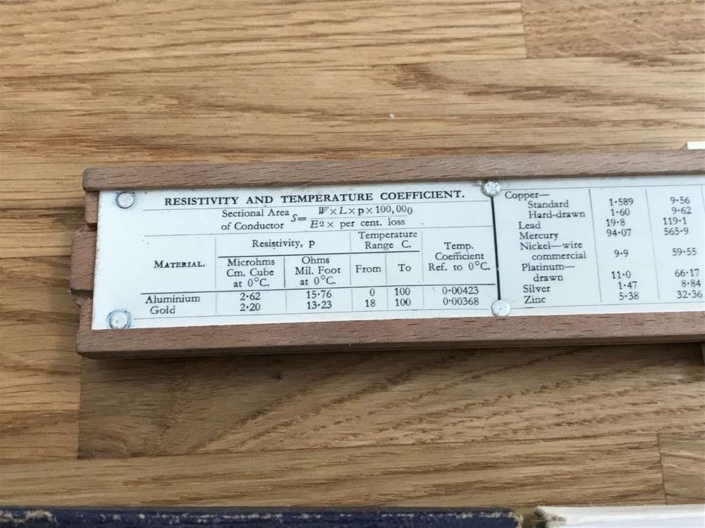 nice old good looking unique electrical slide rule in case