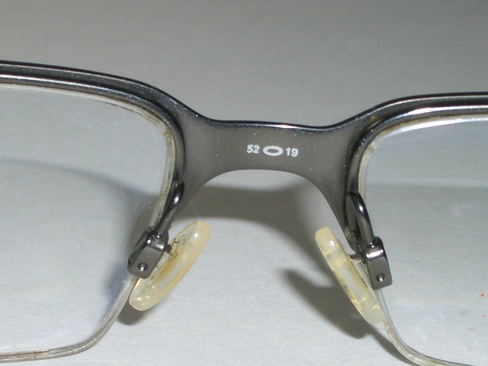 OAKLEY BOOMSTAND 52[]19 PEWTER HALF RIMLESS RECTANGULAR EYEGLASS FRAMES ONLY