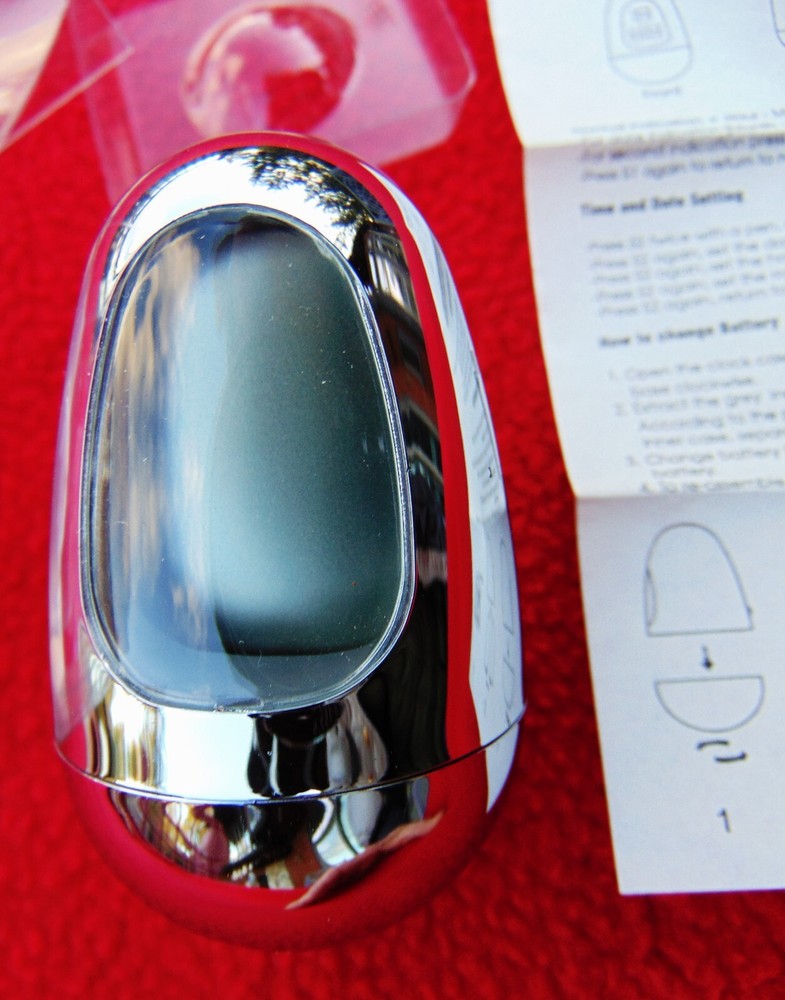 WOBBLE OVAL SILVER EGG CLOCK ~ INCLUDES INSTRUCTIONS ~ 2 3/4" HIGH ~ NEW IN BOX