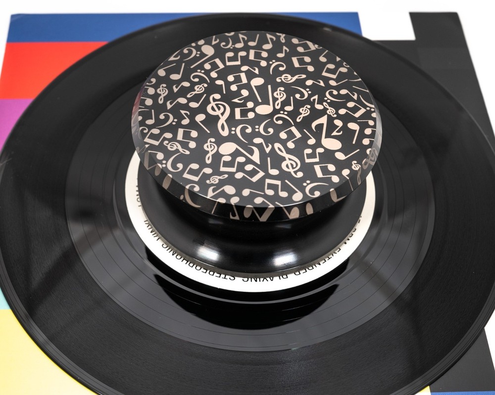 Turntable record weight. Musical Notes engraved quality record stabilizer.