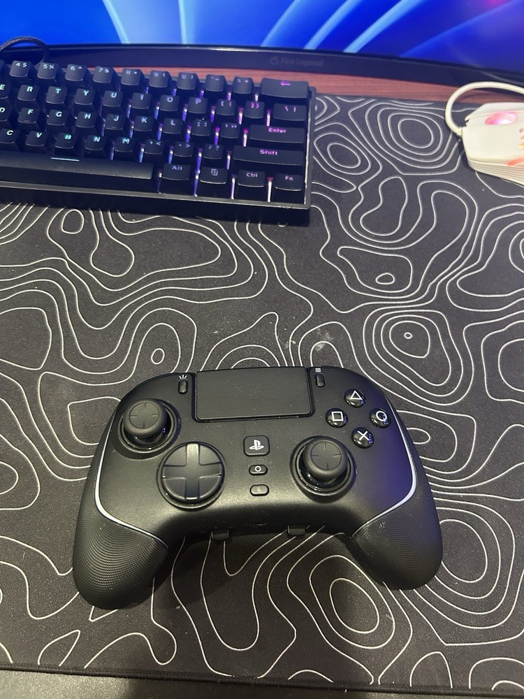 Sony PlayStation 5 Console with Razer Wolverine controller