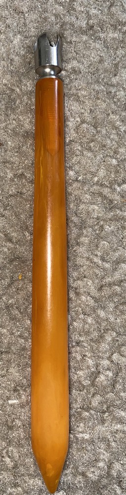 Vtg Butterscotch Bakelite handled tool?