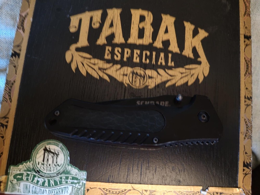 Schrade Folding Pocket Knife with Black Handle