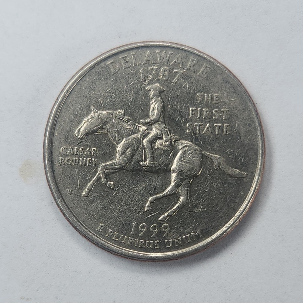 rare error coin1999 delaware state quarter p