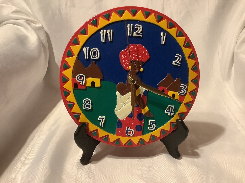 Avon African Village Clock