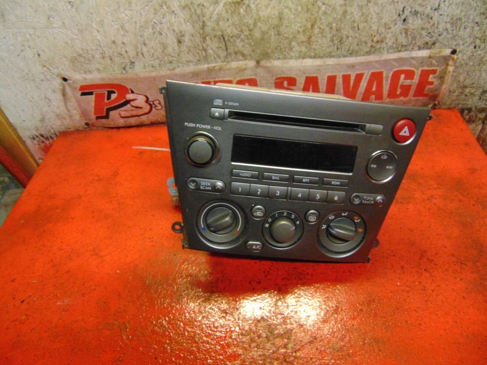 06 05 Subaru Legacy outback cd player changer & climate control switch unit