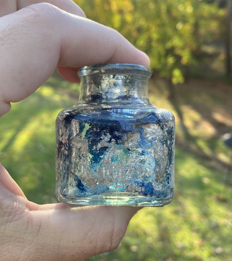 Clear Inkwell With Blue Ink And Partial Label