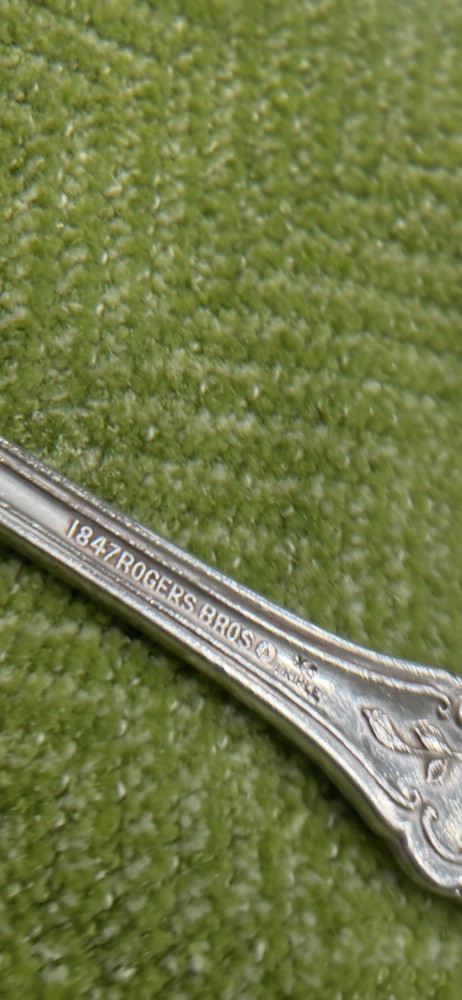 4 silver plate Rogers serving spoons
