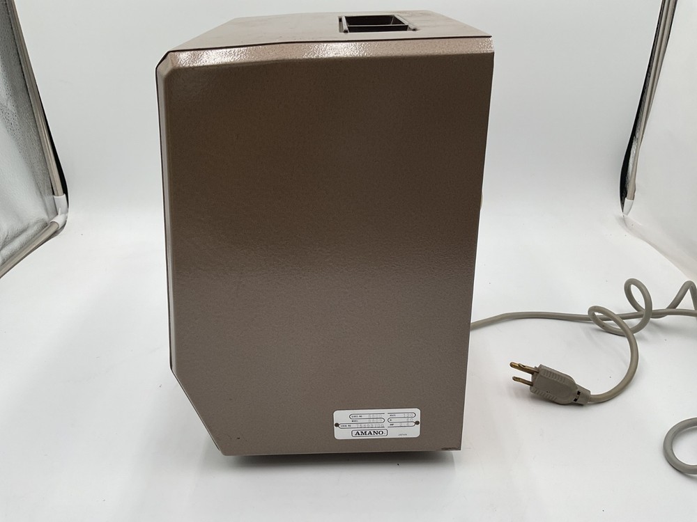 Amano Time Clock 6800 6809 Punch Clock. Keeps time