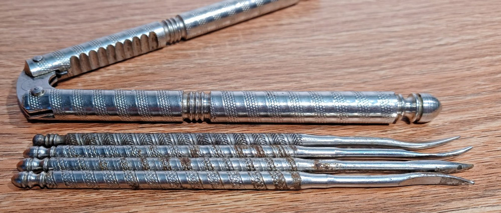 Vintage HMQ Nut Cracker with Four (4) Matching Nut Picks