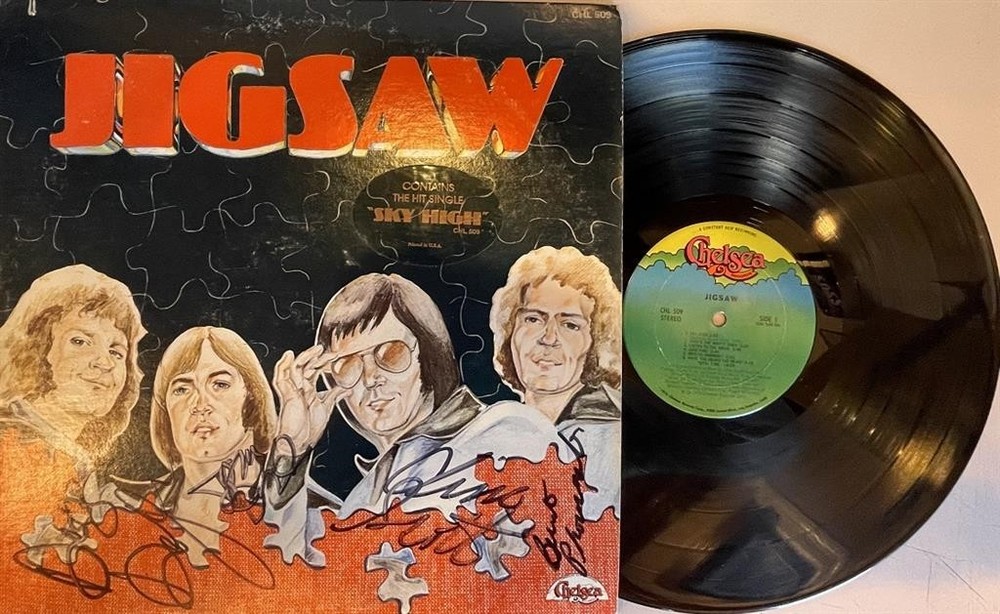 "Jigsaw"- Record Album Signed by 4 Members