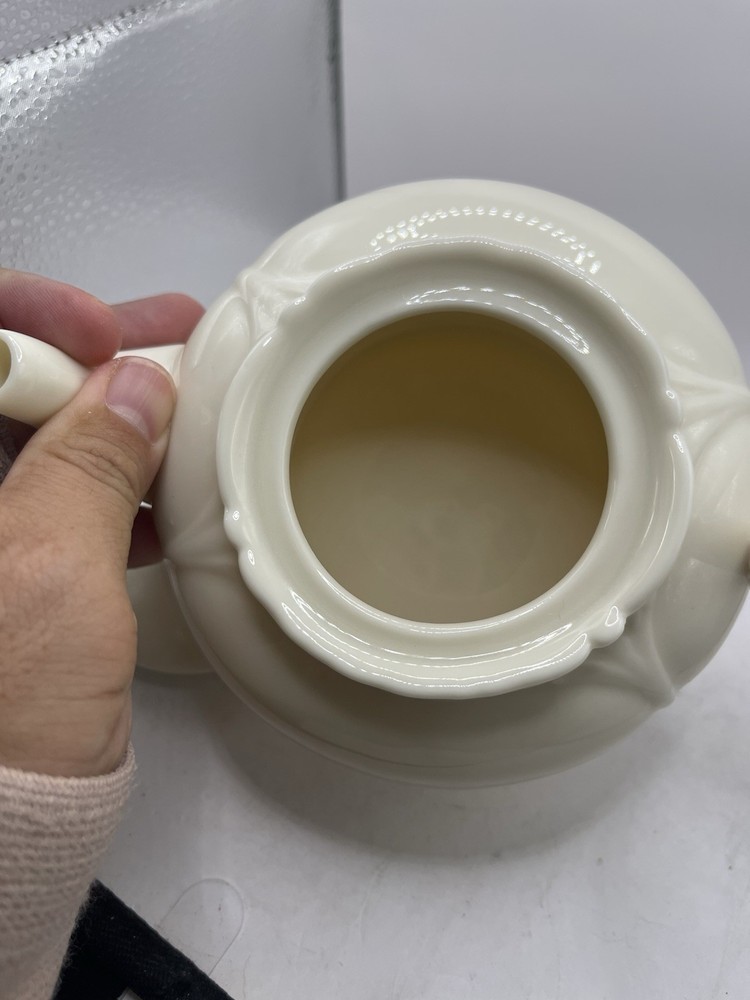 Vintage Ivory Ceramic Teapot with Unique Loop Handle – Elegant Leaf Pattern