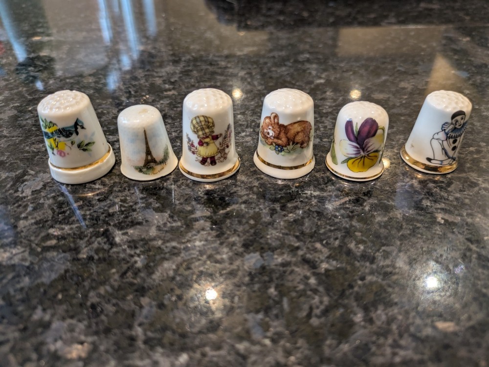 48 Decorative Thimbles in Display Case