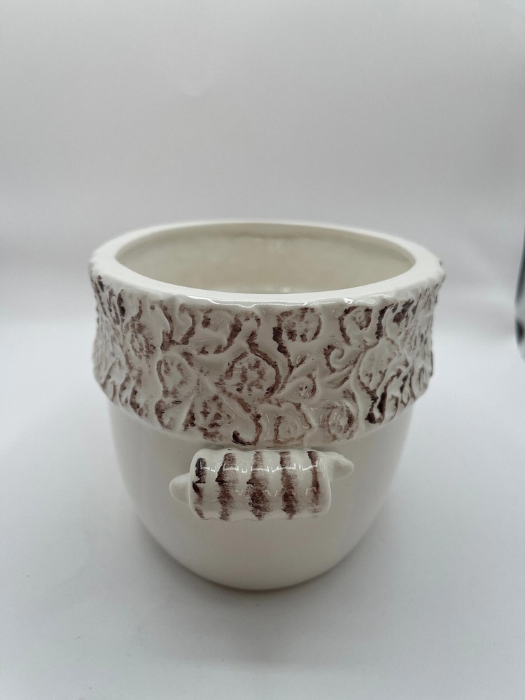 Ivory pottery planter with distressed rim