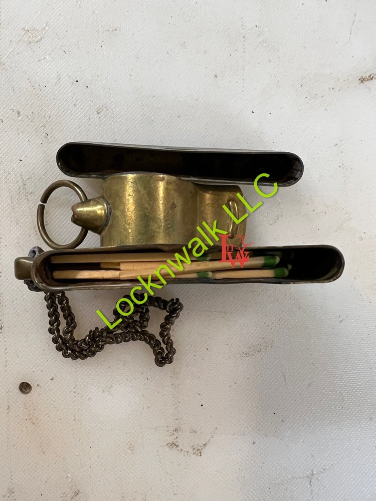 W.W. II - SOLID BRASS WHISTLE & vtg brass military match safe w/original chain