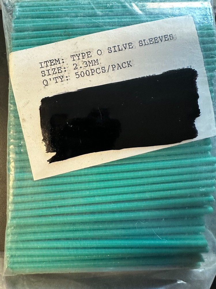 Green 2.3mm Polyester Spring Loop Protectors are packaged 500 pieces per bag