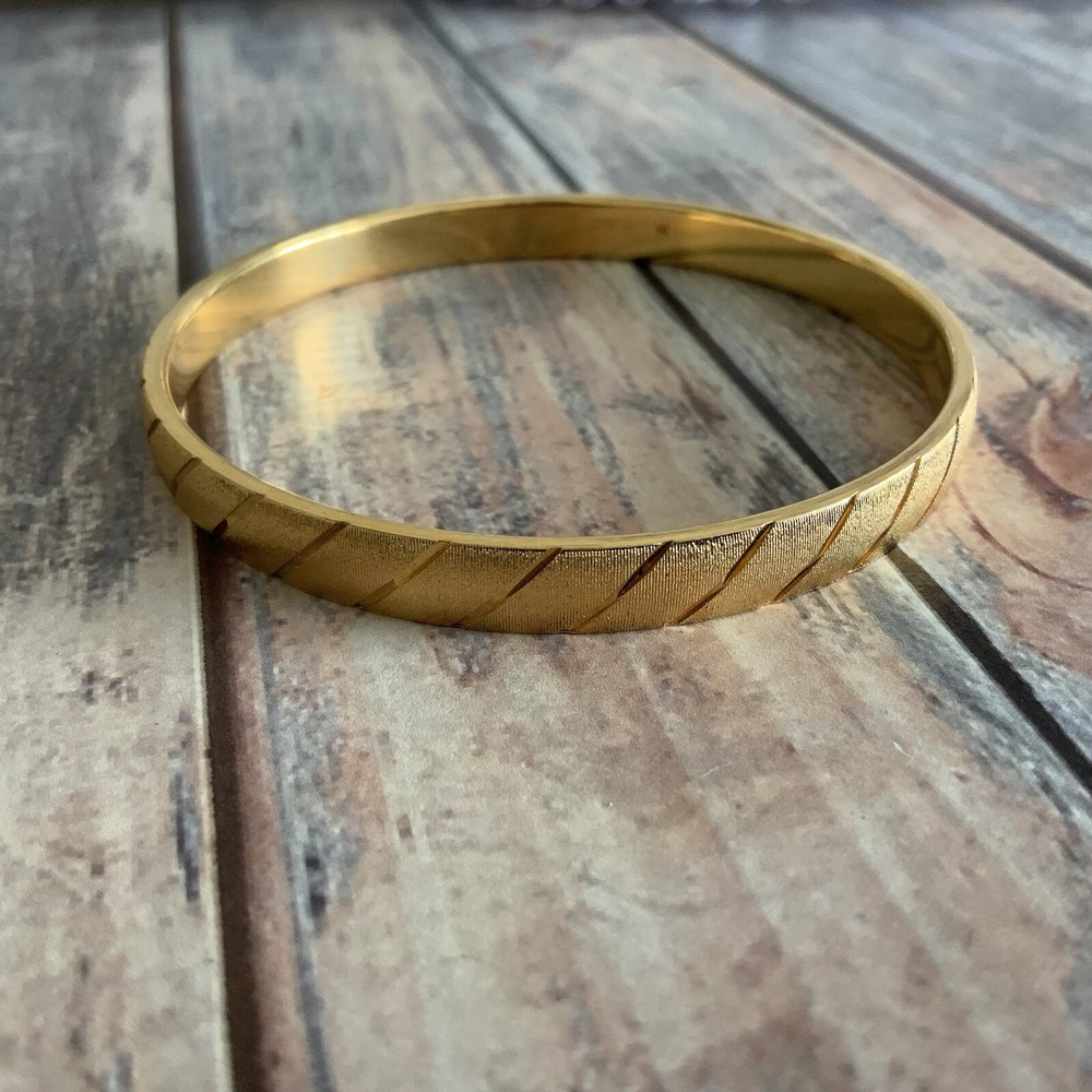 Classic MONET medium sized etched textured diamond dust stripped bangle in gold