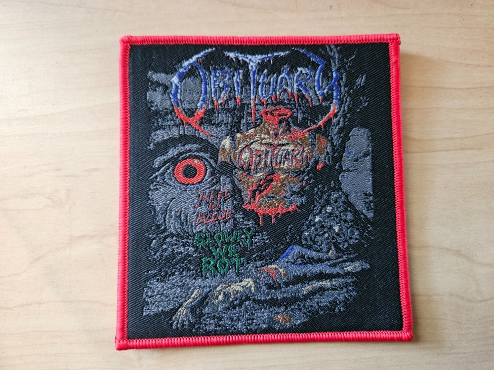 OBITUARY, SLOWLY WE ROT, SEW ON RED BORDER WOVEN PATCH