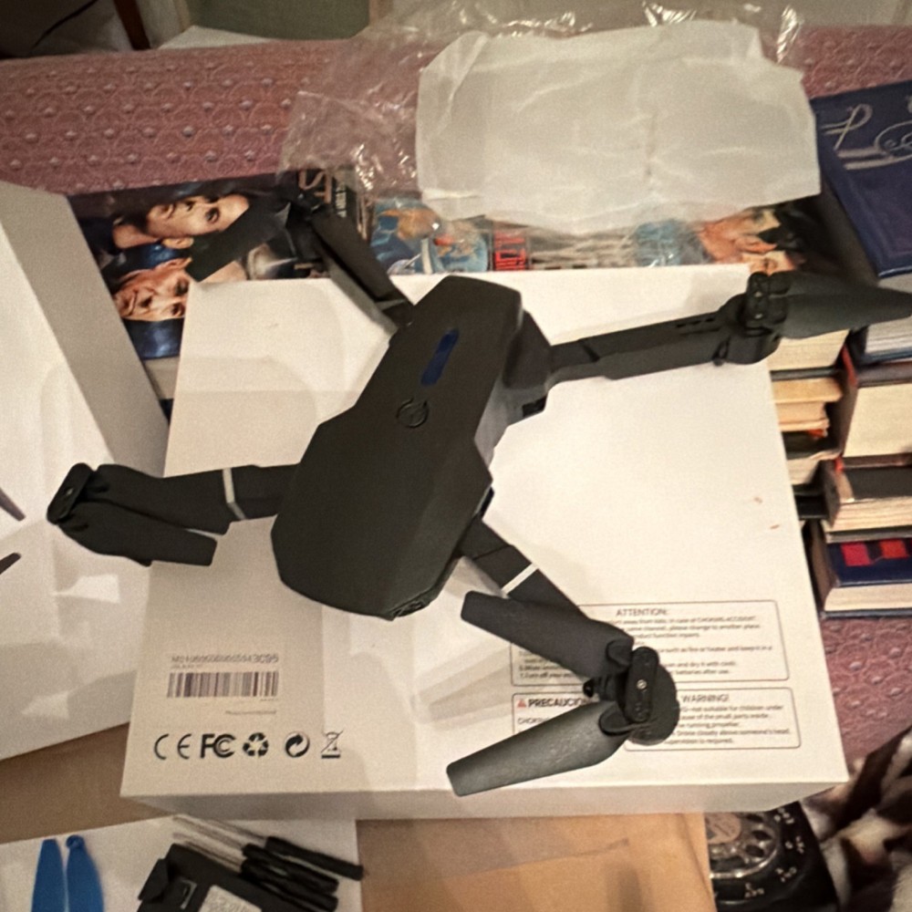 E88 Foldable Toy Grade Quadcopter Drone, Ready to Fly, RC Remote, Black