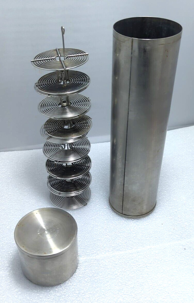 Nikor stainless steel developing tank w/solid cap, 12.5" with (7) 35mm reels