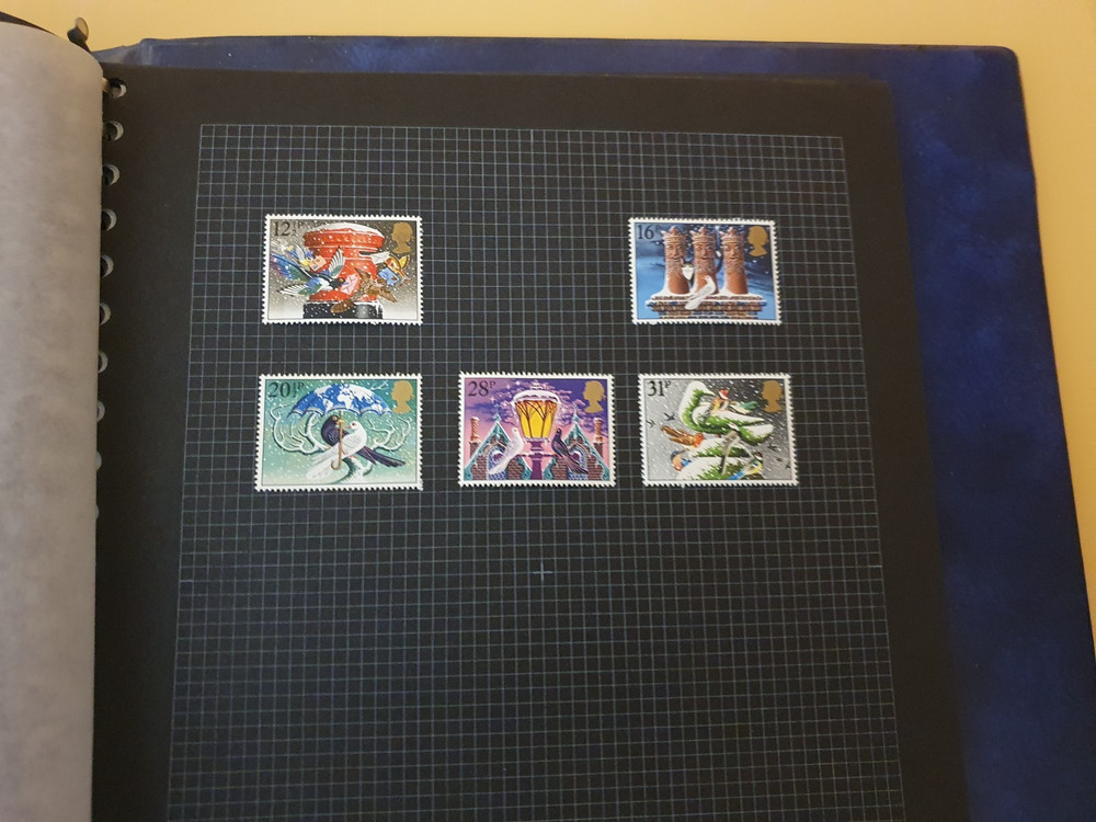 LANCASTER ROSE STAMP ALBUM CONTAINING APPROX 50 MINT GB COMMEMORATIVE SETS #3240