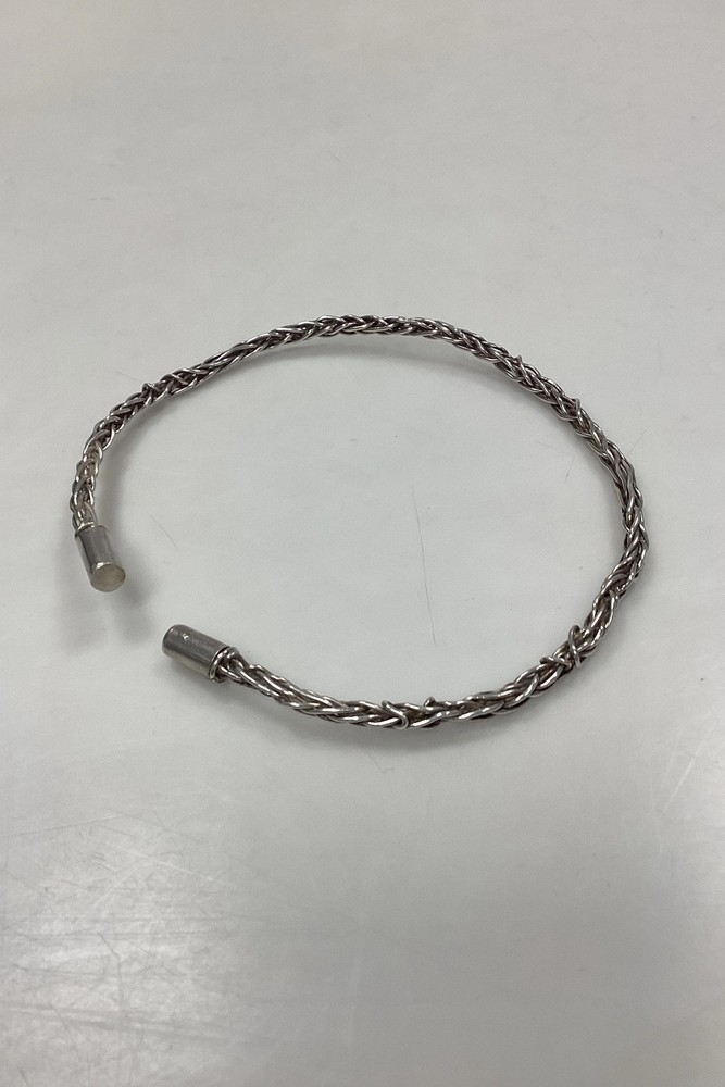 Modern Open Braided Open Neck Ring in Sterling Silver