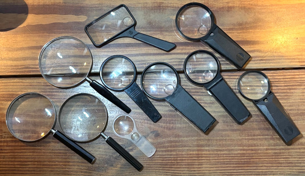 Handheld magnifying glasses - (10) assorted magnifying glasses, various sizes