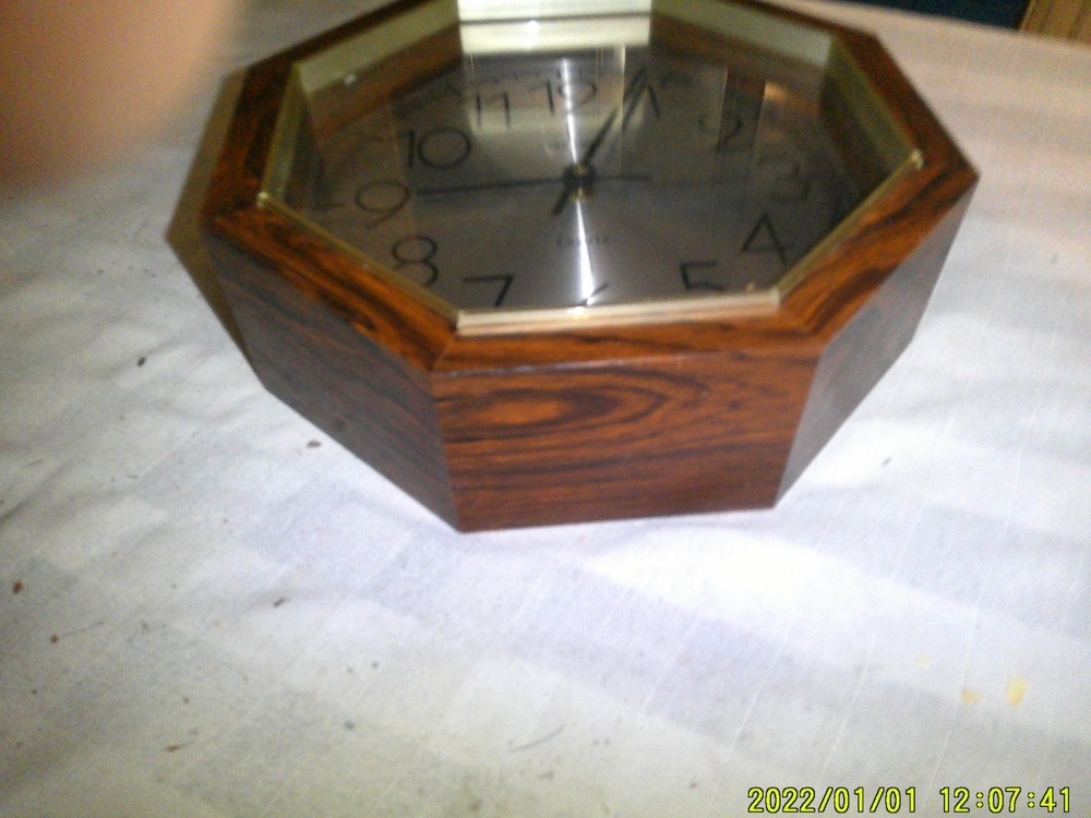 WALL HANGING OLDER HEXAGON SHAPE VERICHRON CLOCK.