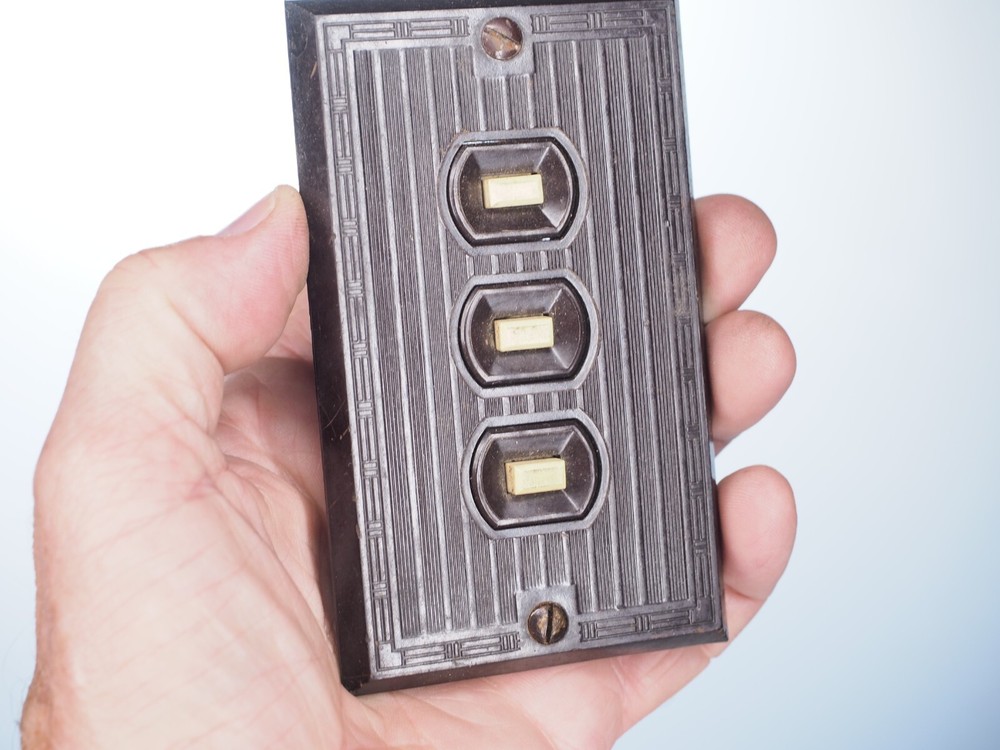Antique bakelite push three button switch plate and switch