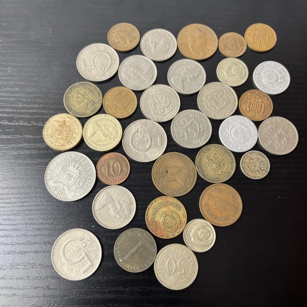 34 International Coins.