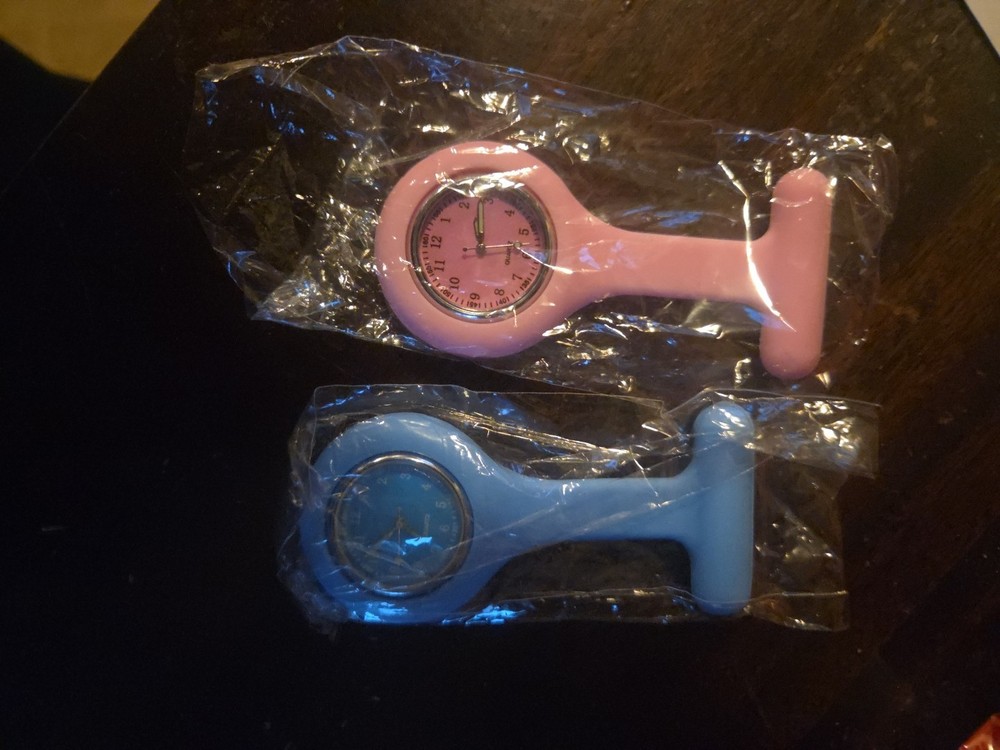 Nurses Clocks With A Pin To Put On Scrubs While Working