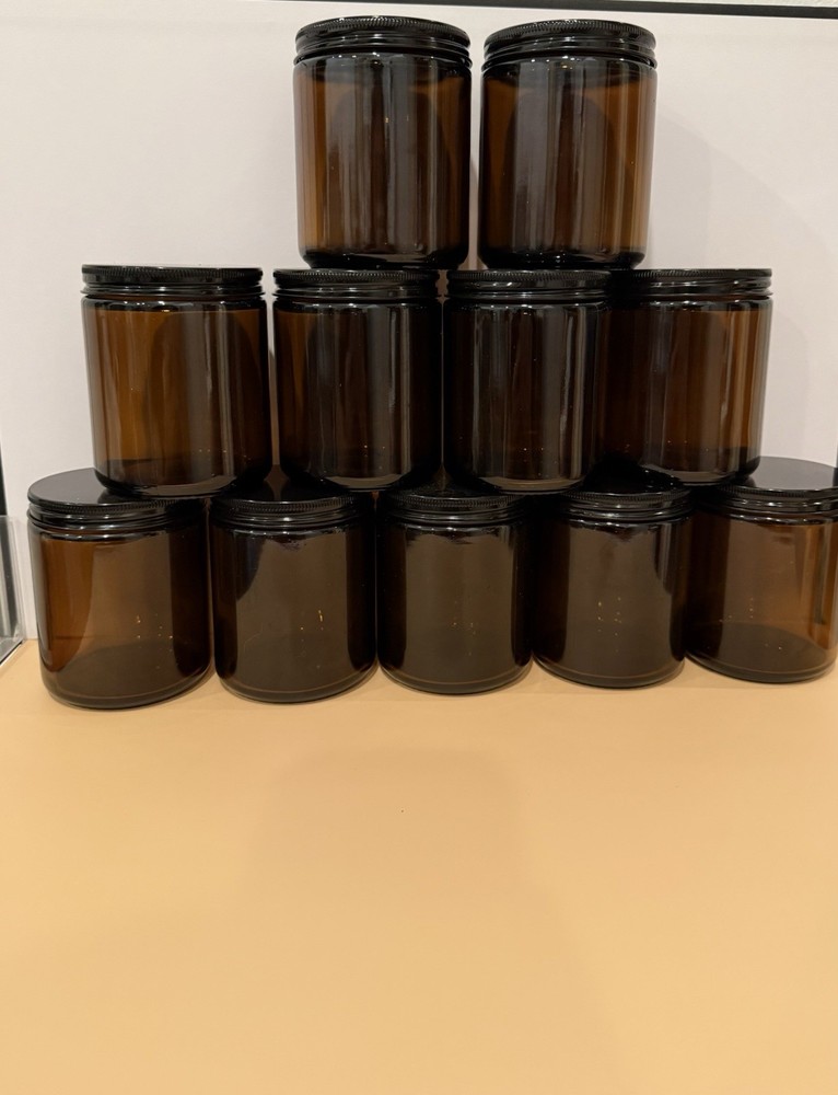 11 empty candle jars with lids