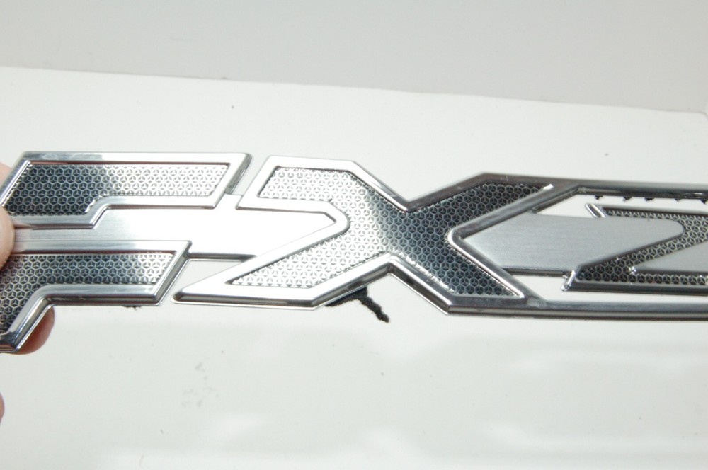 Authentic Skeeter Emblem FX20 Black & Silver USED FACTORY DECAL